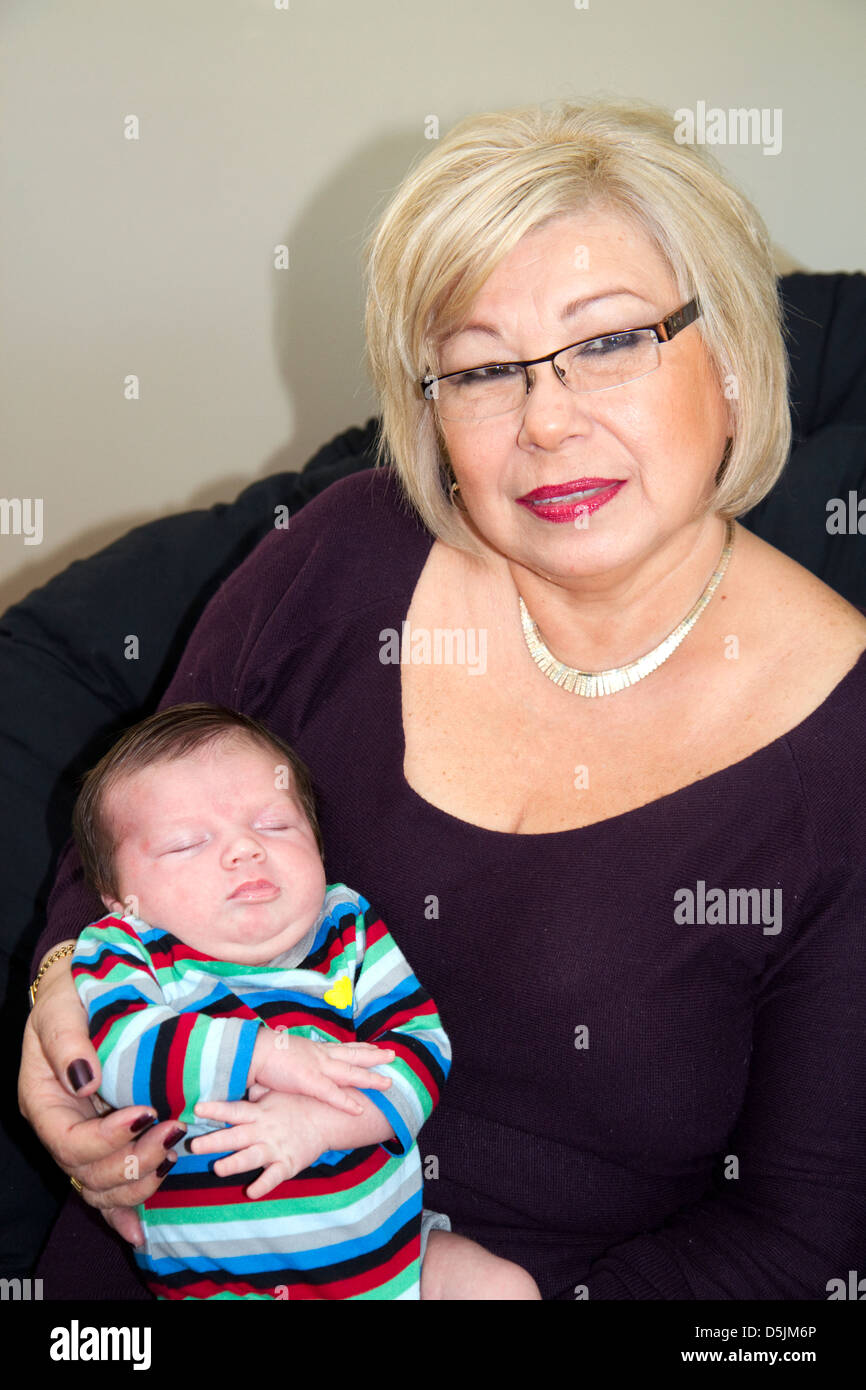 Grandmother and new born baby hi-res stock photography and images - Alamy, image size:866x1390