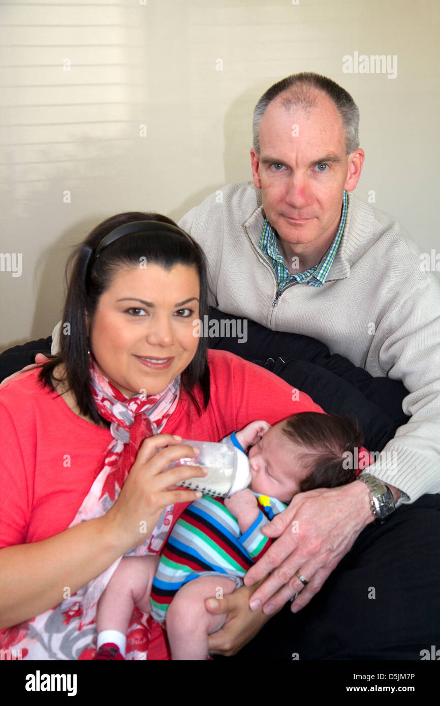 Caucasian father and hispanic mother with their infant son in Boise, Idaho, USA. MR Stock Photo