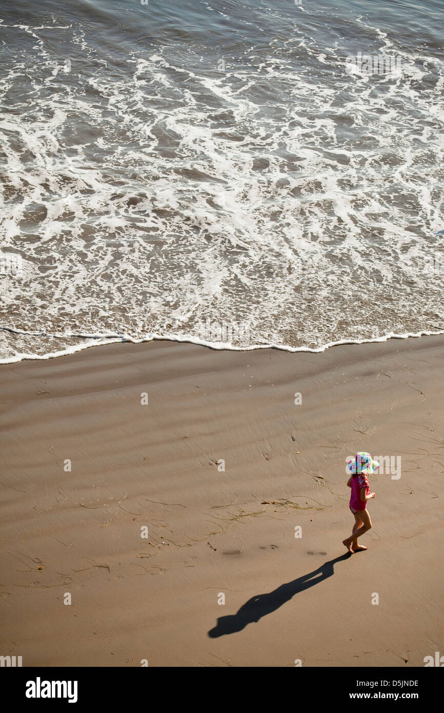 Girl, ocean, beach, small, child, play, vast Stock Photo