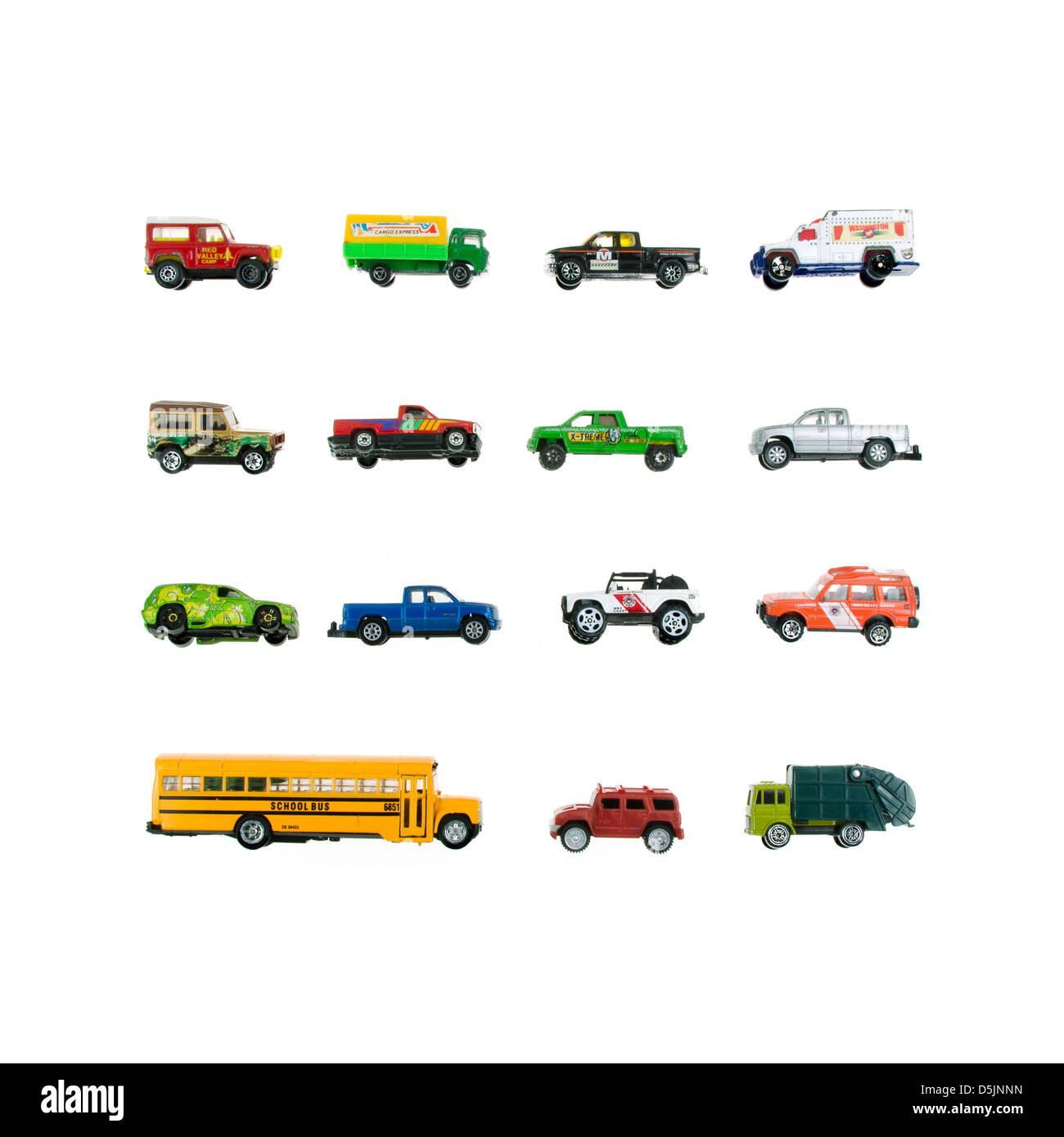 Toy trucks arranged in a grid on a white background. Stock Photo