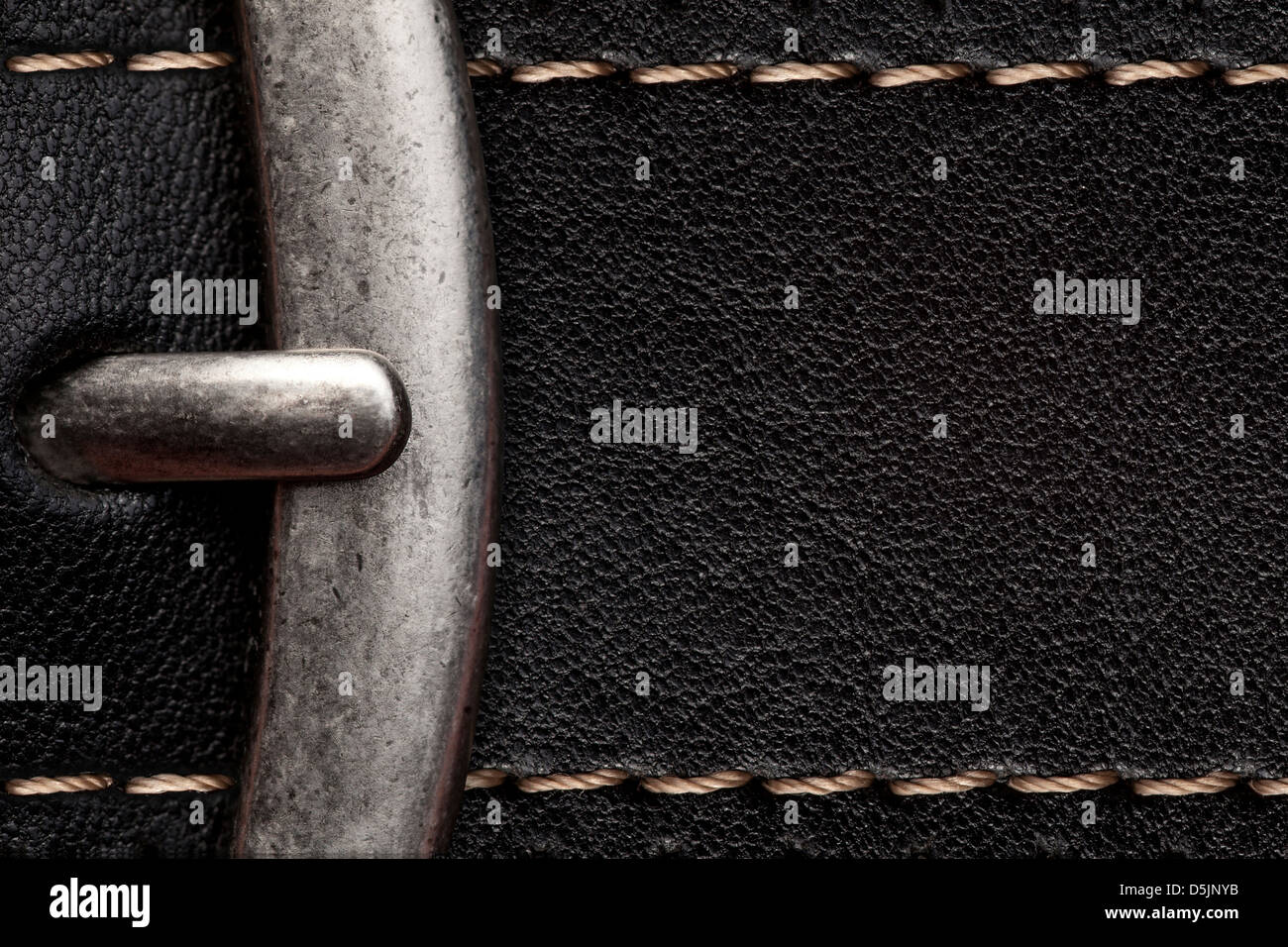 closeup of clasp belt detail or black leather background with clamp Stock Photo