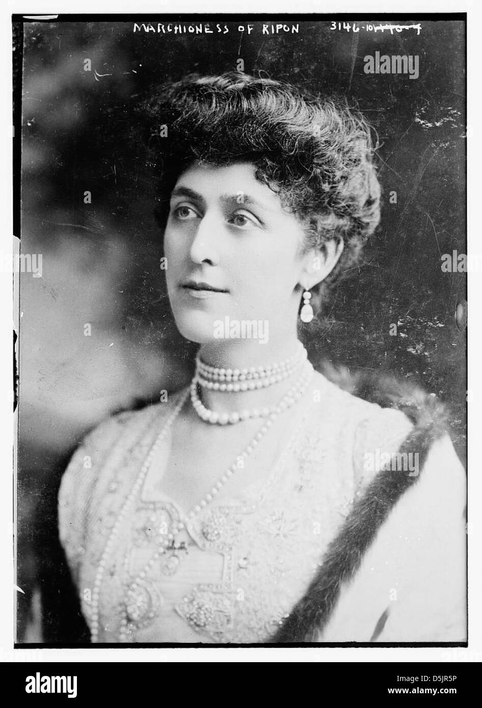 The Marchioness of Ripon is shown in a beaded dress, featuring pearls ...