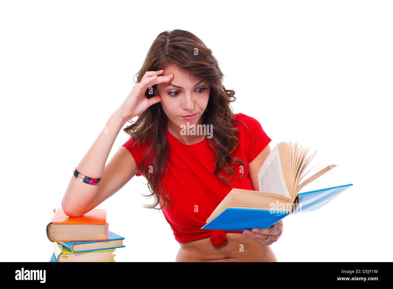 Girl reading interesting book over white background Stock Photo - Alamy