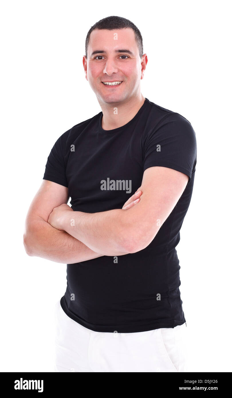 Young cheerful man posing with folded arms over white background Stock Photo