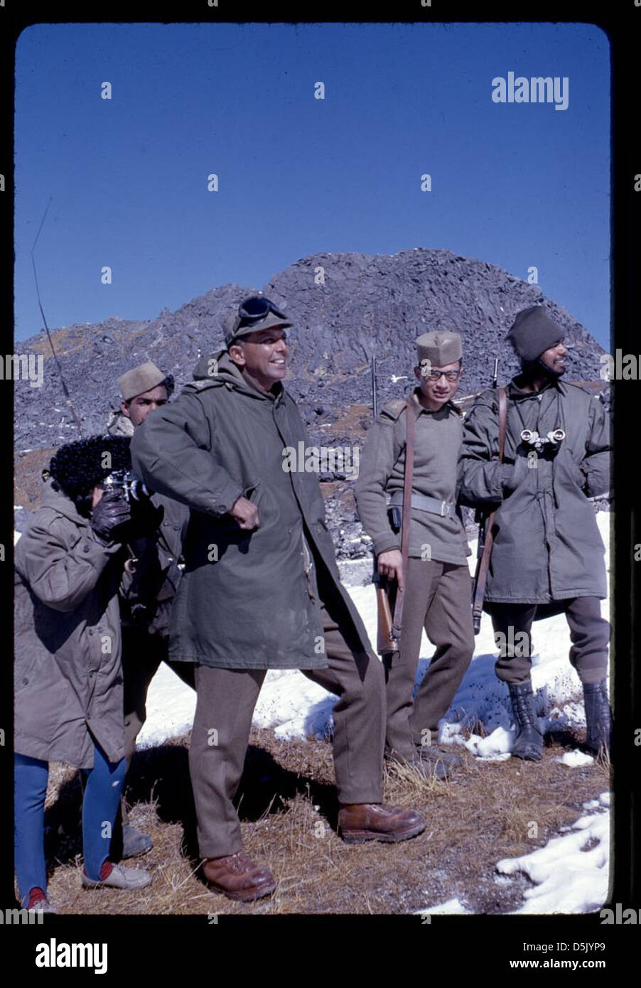 [Alice Kandell hiding behind a Sikkimese soldier to take a photograph of a Chinese soldier along the Nathu La pass, Sikkim] (LOC) Stock Photo