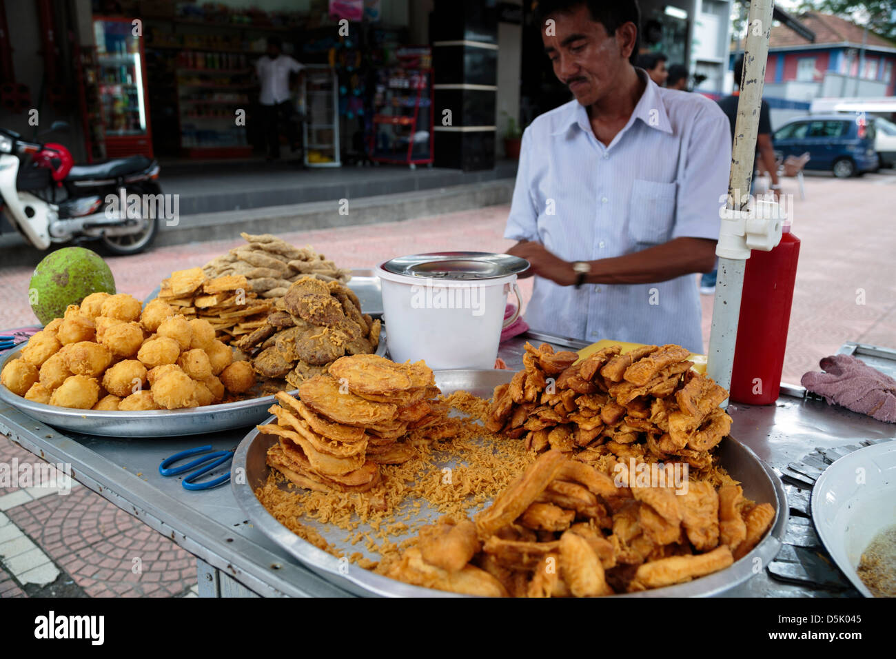 A Malaysian street vendor selling popular local snacks Stock Photo