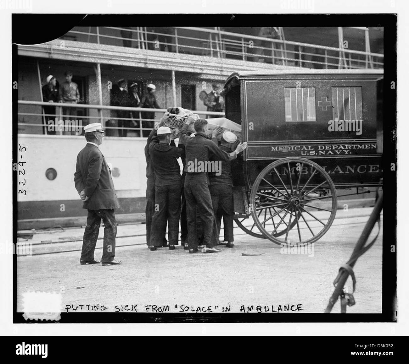 Putting sick from SOLACE in Navy ambulance (LOC) Stock Photo
