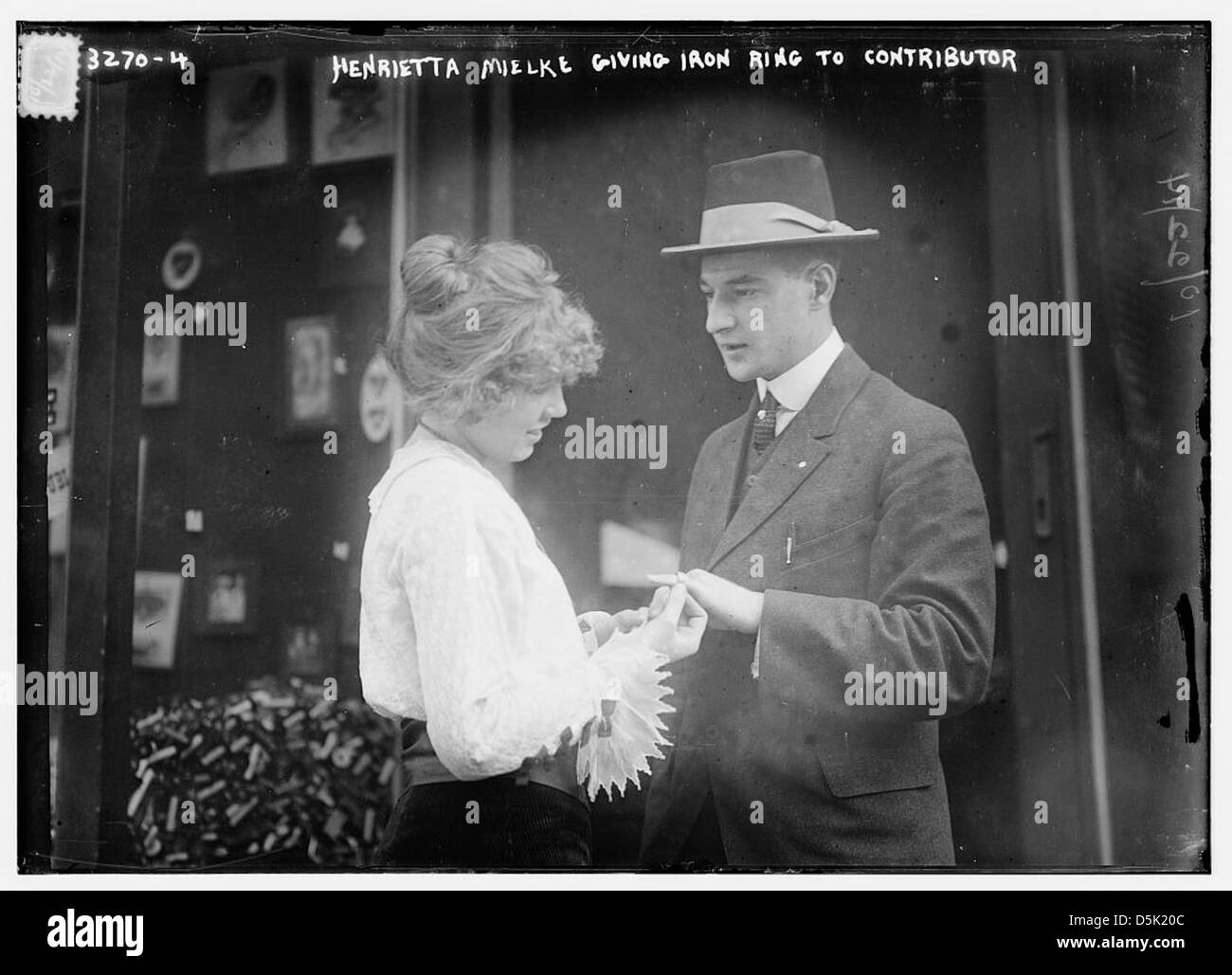 Henrietta Mielke giving iron ring to contributor (LOC) Stock Photo