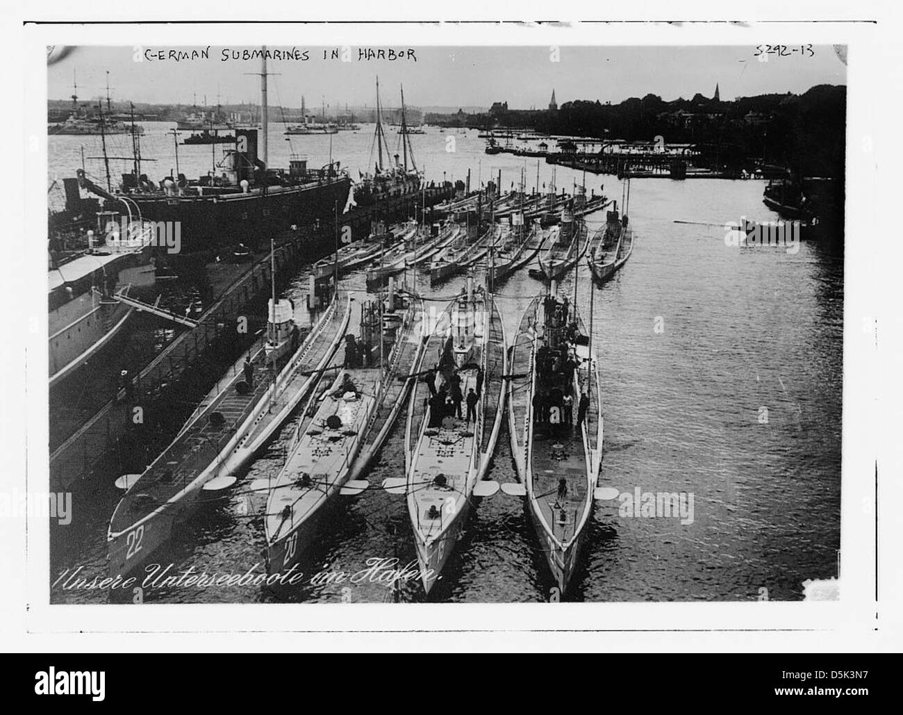 German submarines, including U-boats, are shown in harbor during the First World War, marking a key aspect of naval warfare. Stock Photo