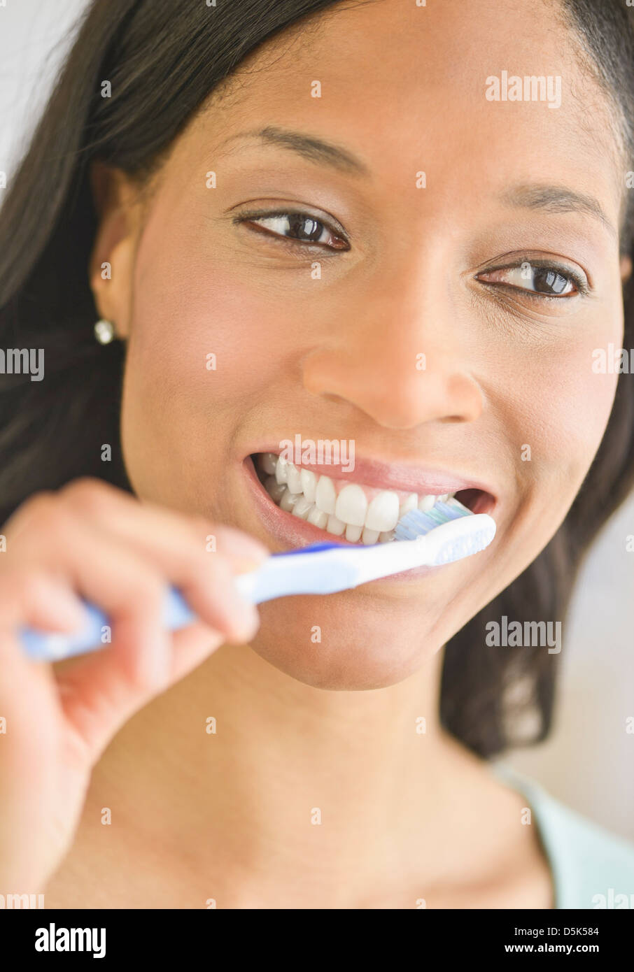 Woman brushing teeth Stock Photo Alamy