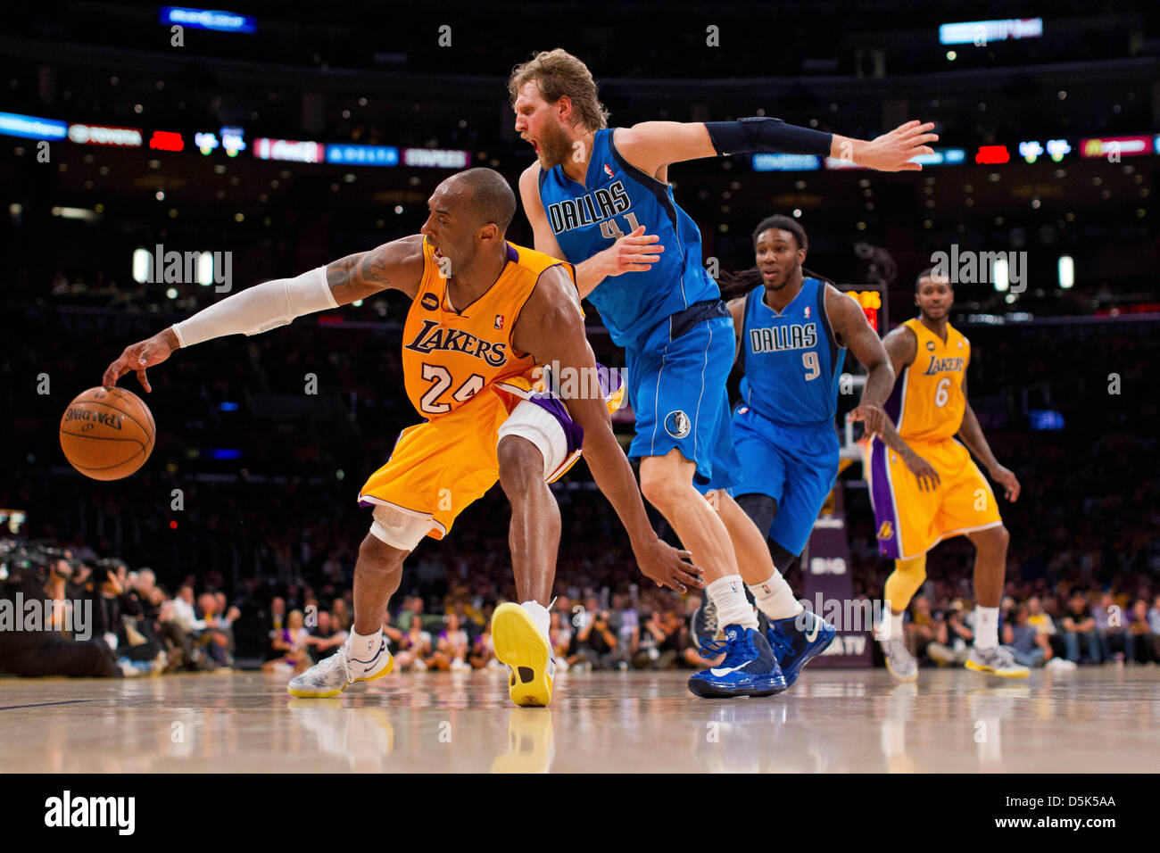 Los Angeles, California, USA. 2nd April 2013. Guard (24) Kobe Bryant of the Los Angeles Lakers has the ball knocked out his hand by (41) Dirk Nowitzki of the Dallas Mavericks during the second half of the Lakers 101-81 victory over the Mavericks at the STAPLES Center in Los Angeles, CA. Credit: Action Plus Sports Images / Alamy Live News Stock Photo