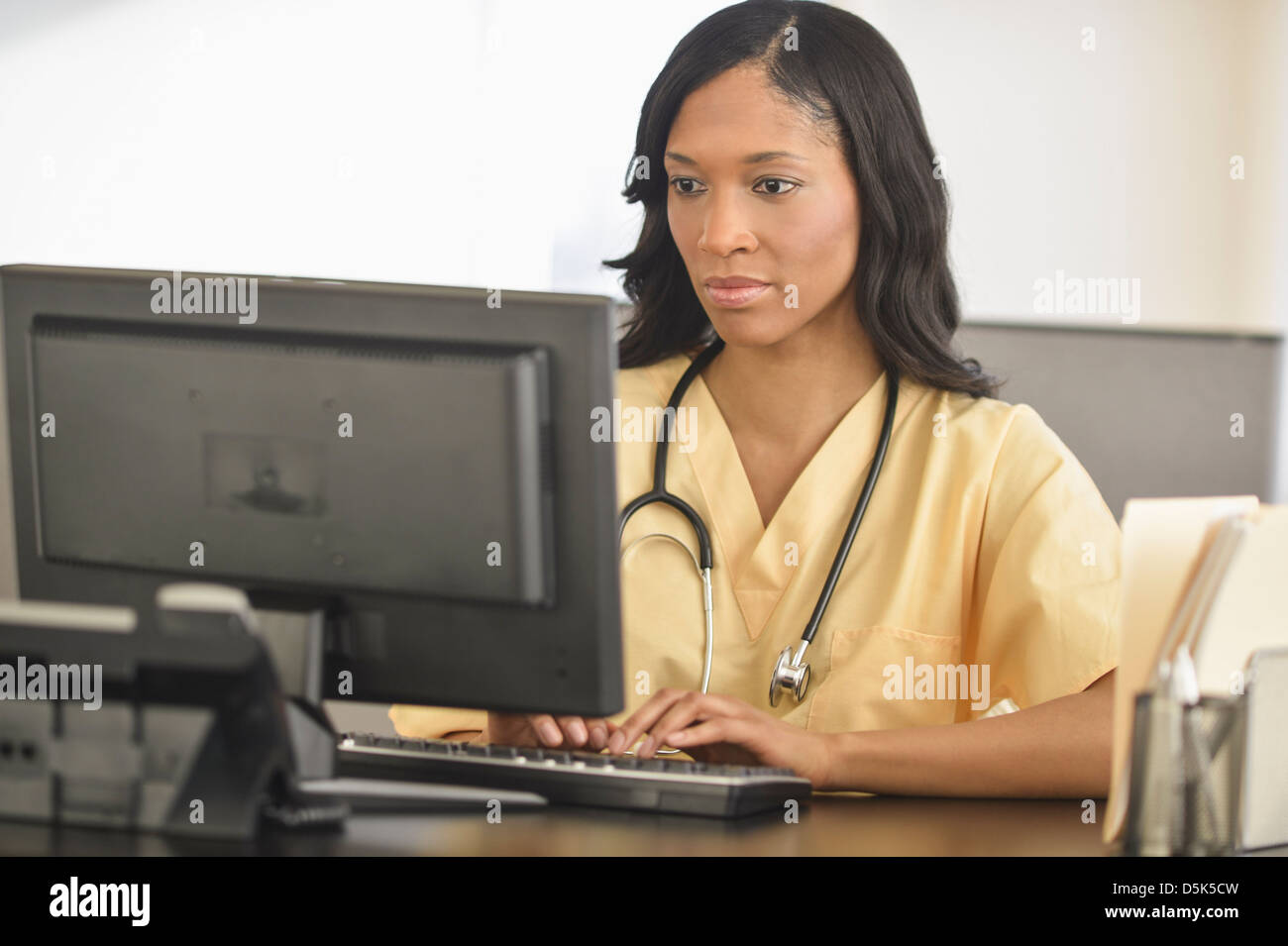 Nurse typing hi-res stock photography and images - Alamy