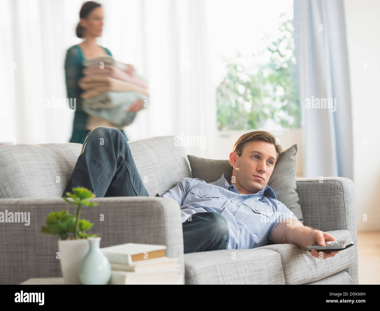 Couch potato couple hires stock photography and images Alamy