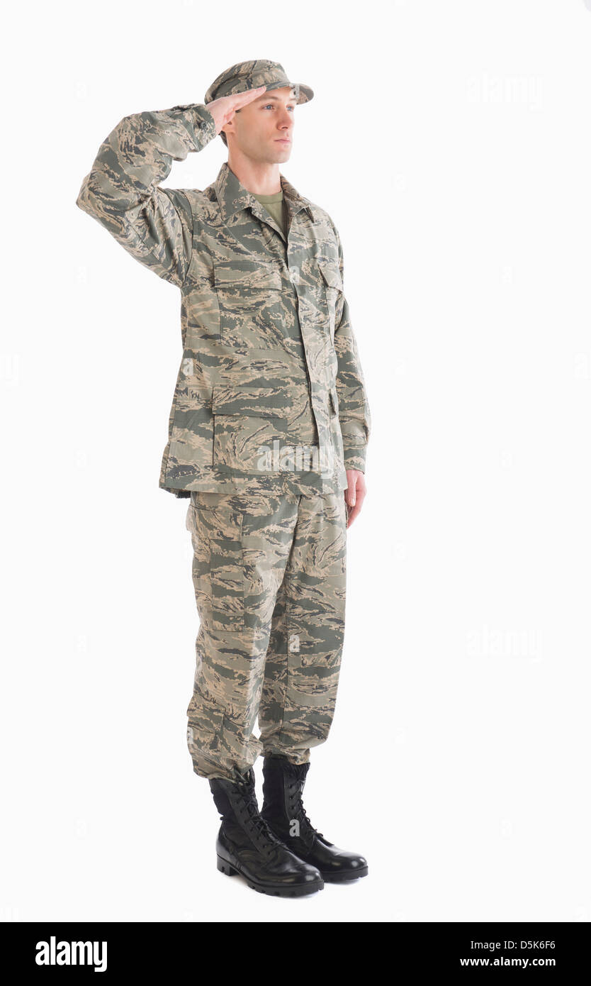 Studio shot of saluting soldier Stock Photo