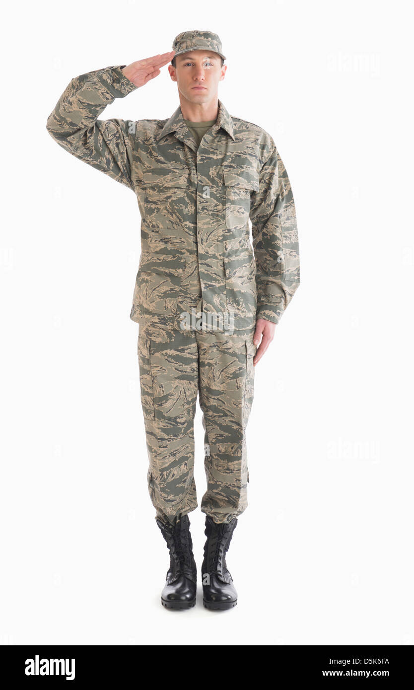 Studio shot of saluting soldier Stock Photo