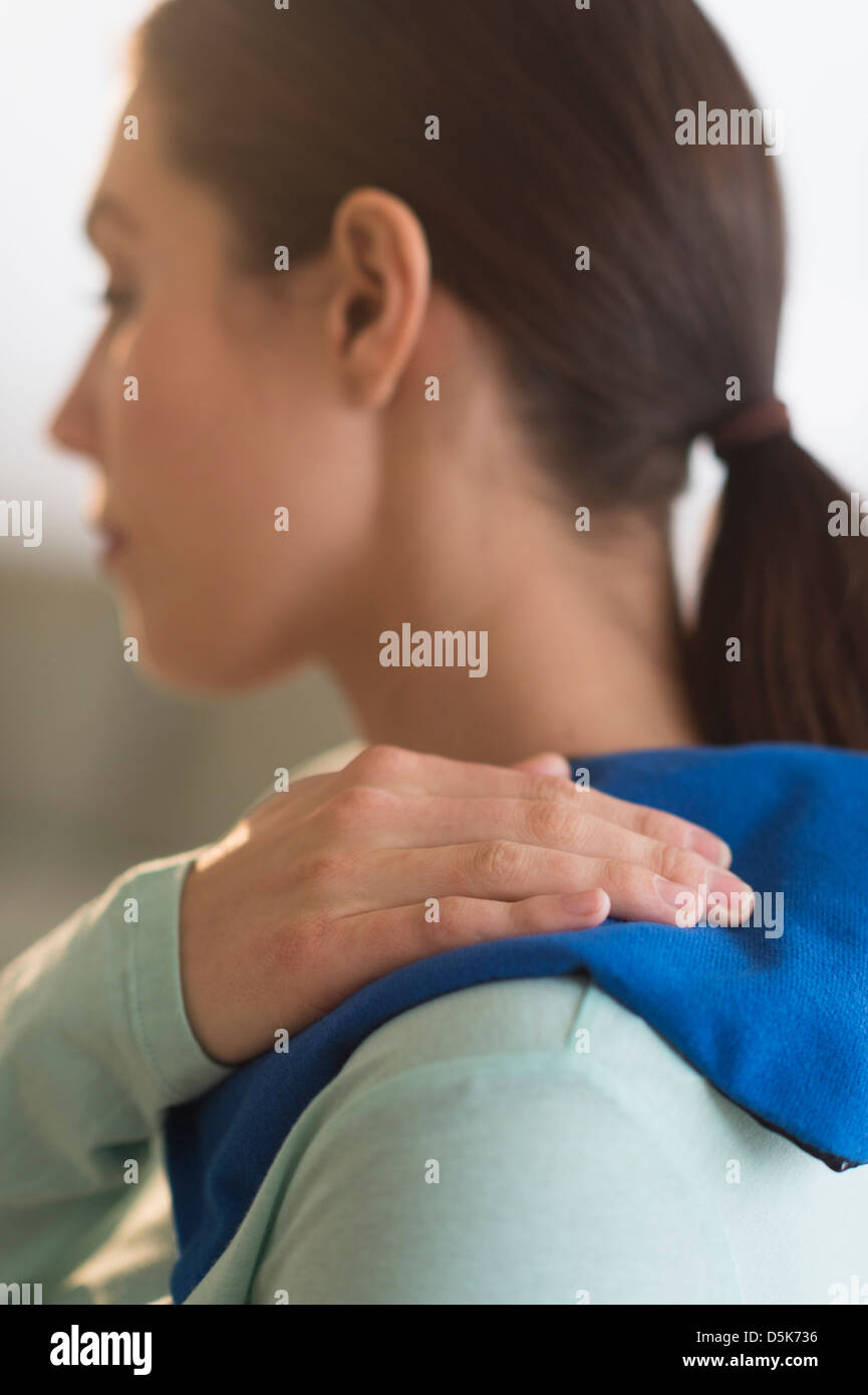 Woman touching aching back Stock Photo