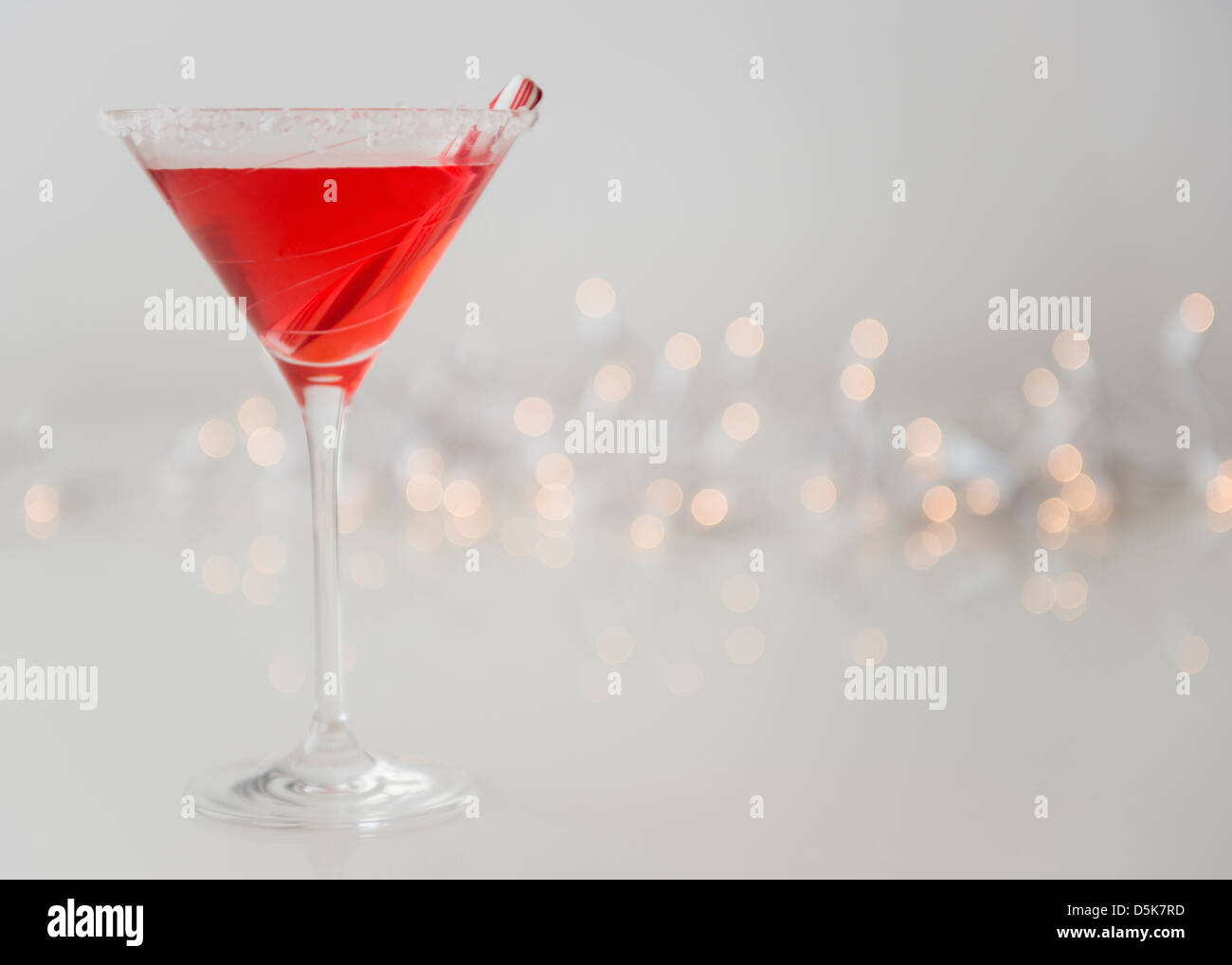 Studio shot of red cocktail in martini glass Stock Photo