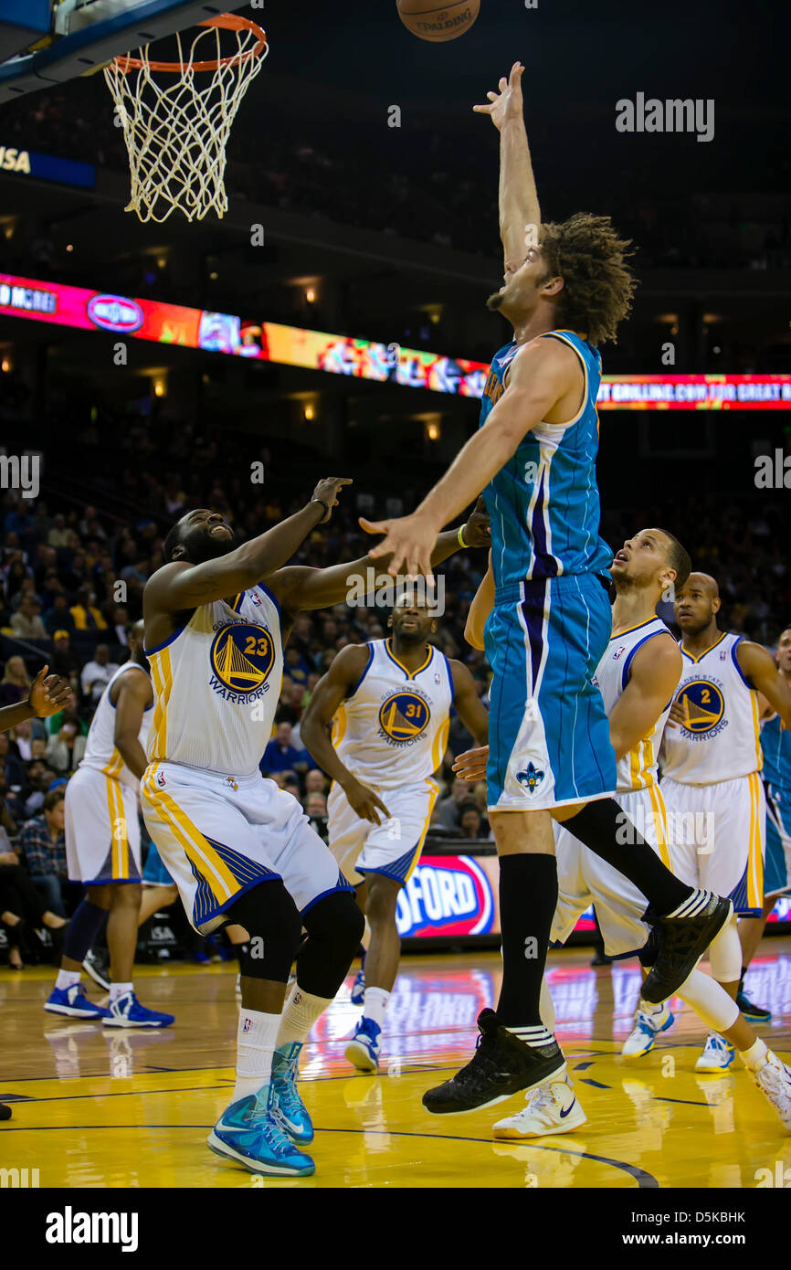Oakland, CA, USA. April 3, 2013: New Orleans Hornets center Robin Lopez  (15) in action during the NBA basketball game between the New Orleans  Hornets and the Golden State Warriors at the
