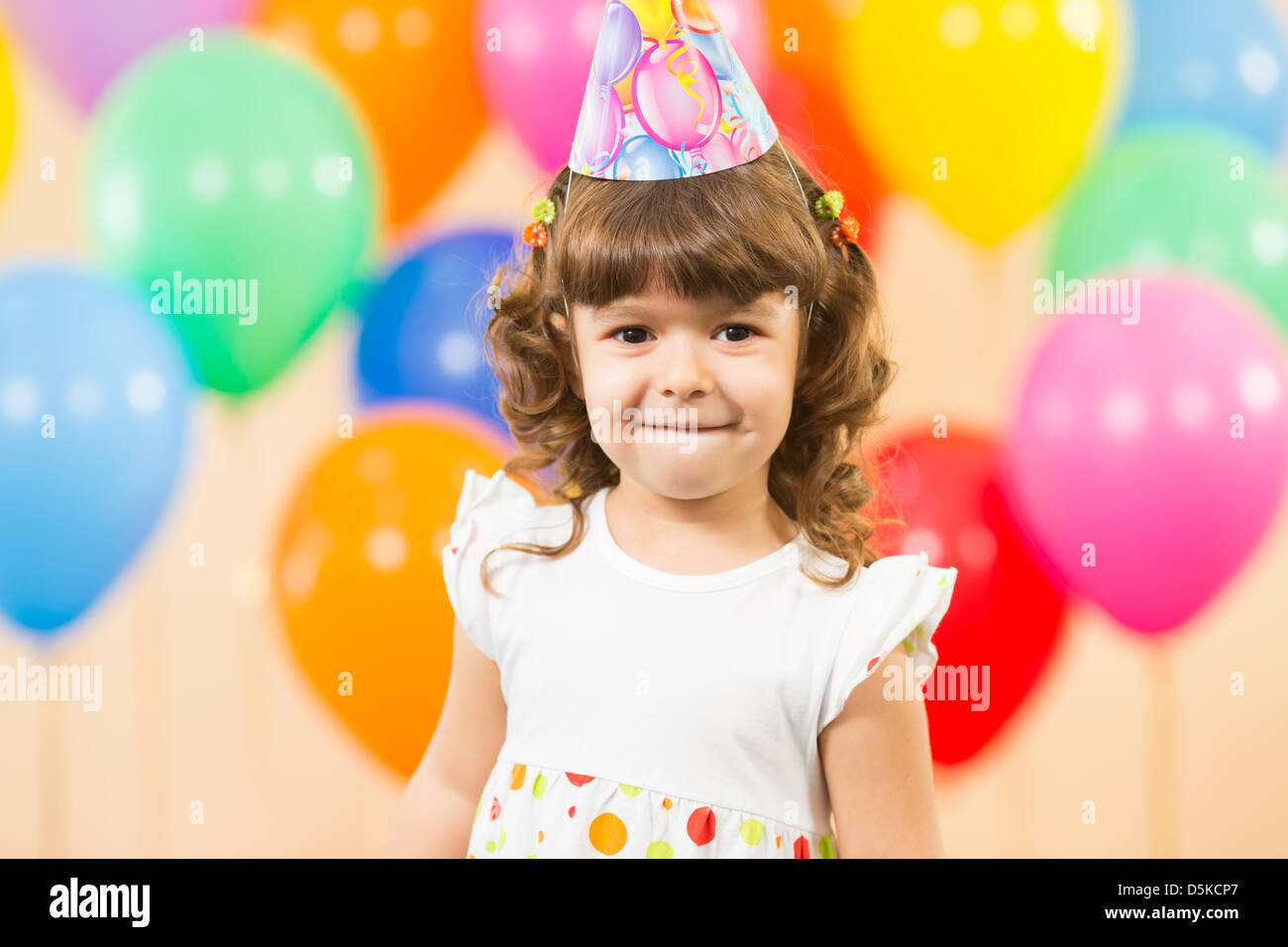 joyful kid girl on birthday party Stock Photo