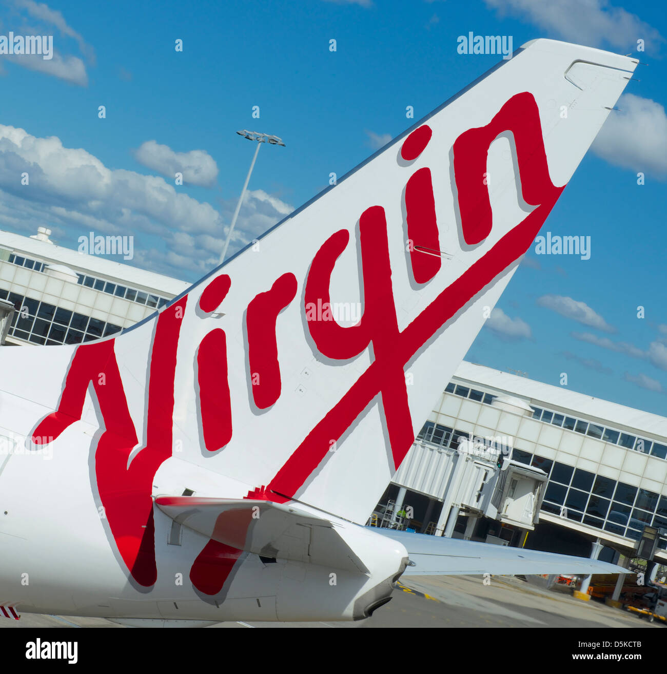 Tail fin of a Virgin Australia 320 aircraft at Sydney airport Stock Photo