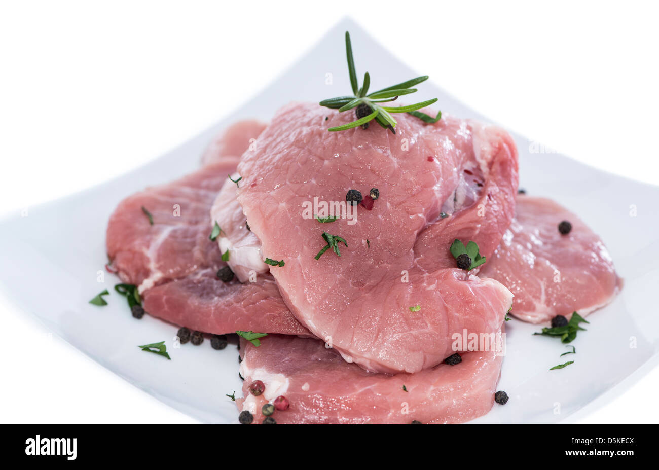 Raw Schnitzel on a plate (isolated on white background Stock Photo - Alamy