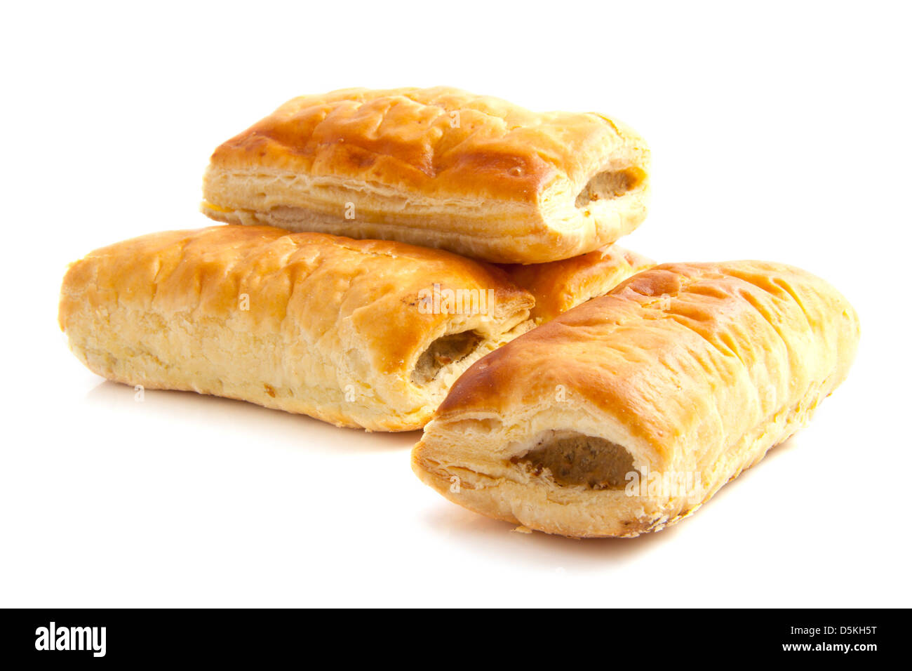 Four Sausage Rolls Isolated On A White Background Stock Photo Alamy