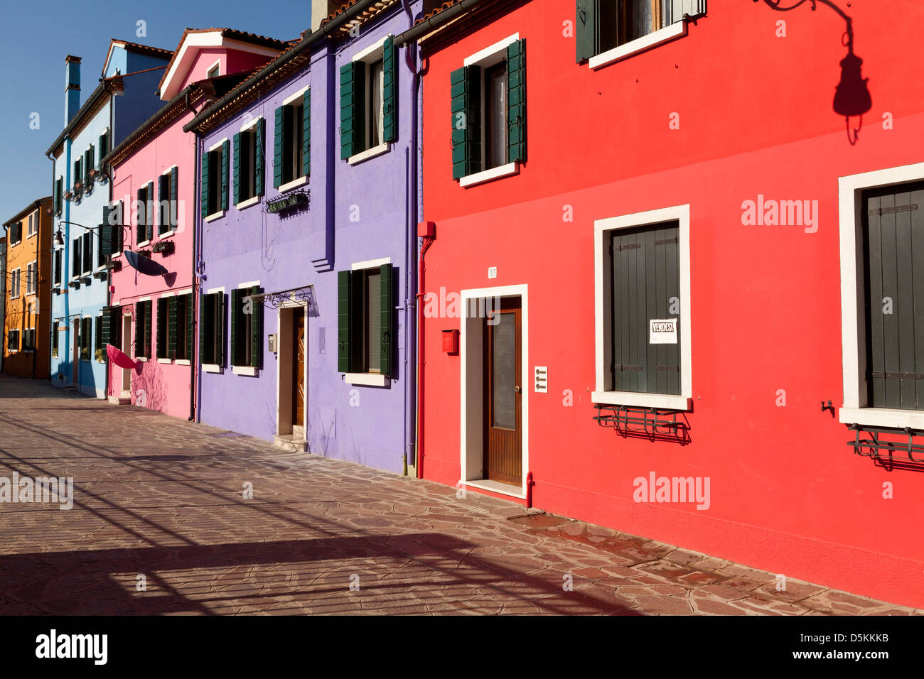 The island of Burano is famous for its brightly coloured houses. Stock Photo