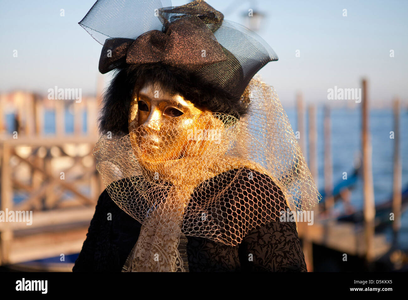 The Carnival of Venice is an annual festival  and revellers wear traditional face masks and costumes. Stock Photo