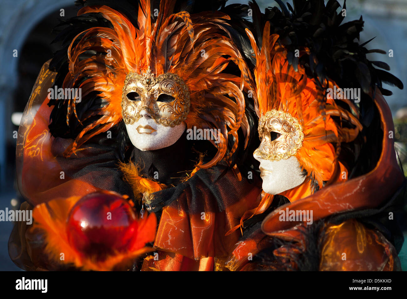The Carnival of Venice is an annual festival  and revellers wear traditional face masks and costumes. Stock Photo
