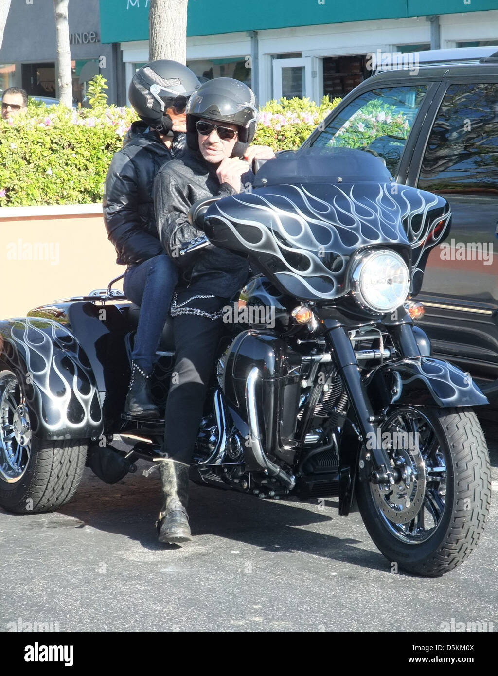 Aging French Rocker Johnny Hallyday Opts A 3 Wheel Harley Davidson Motorbike When He Takes His Wife Laeticia Hallyday A Stock Photo Alamy