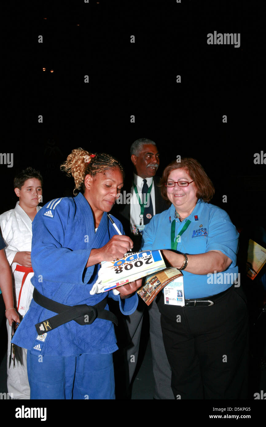 Yurisel Laborde, a gold-medal winner at the Pan-American Judo signing a autograph Stock Photo