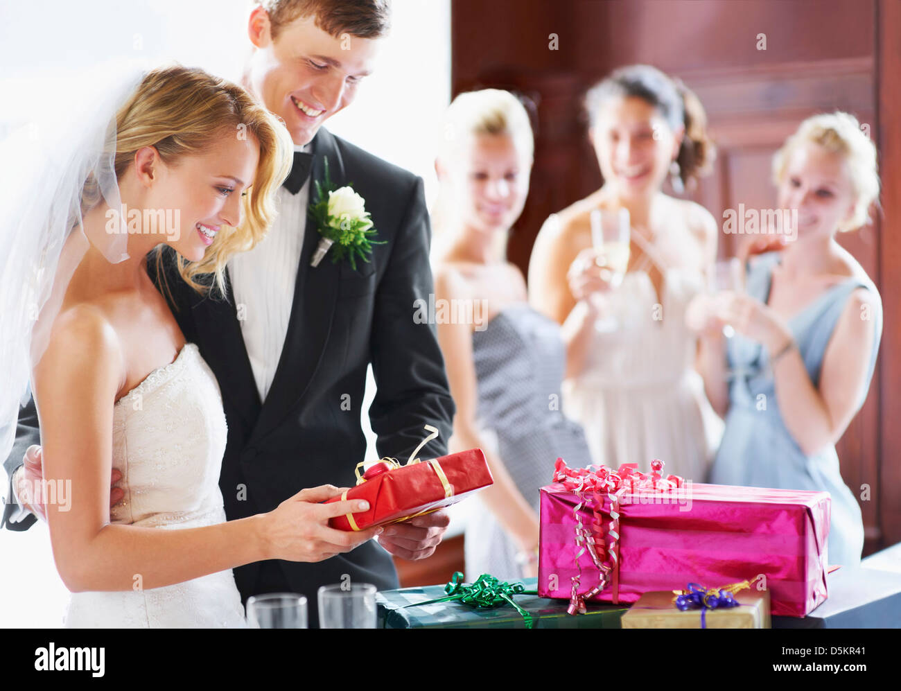 South Africa, Cape Town, Wedding couple opening gifts Stock Photo