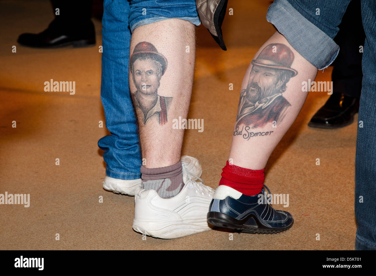 Fans showing off their tattoos of Terence Hill and Bud Spencer during a Bud  Spencer signing session at Thalia bookstore Stock Photo - Alamy