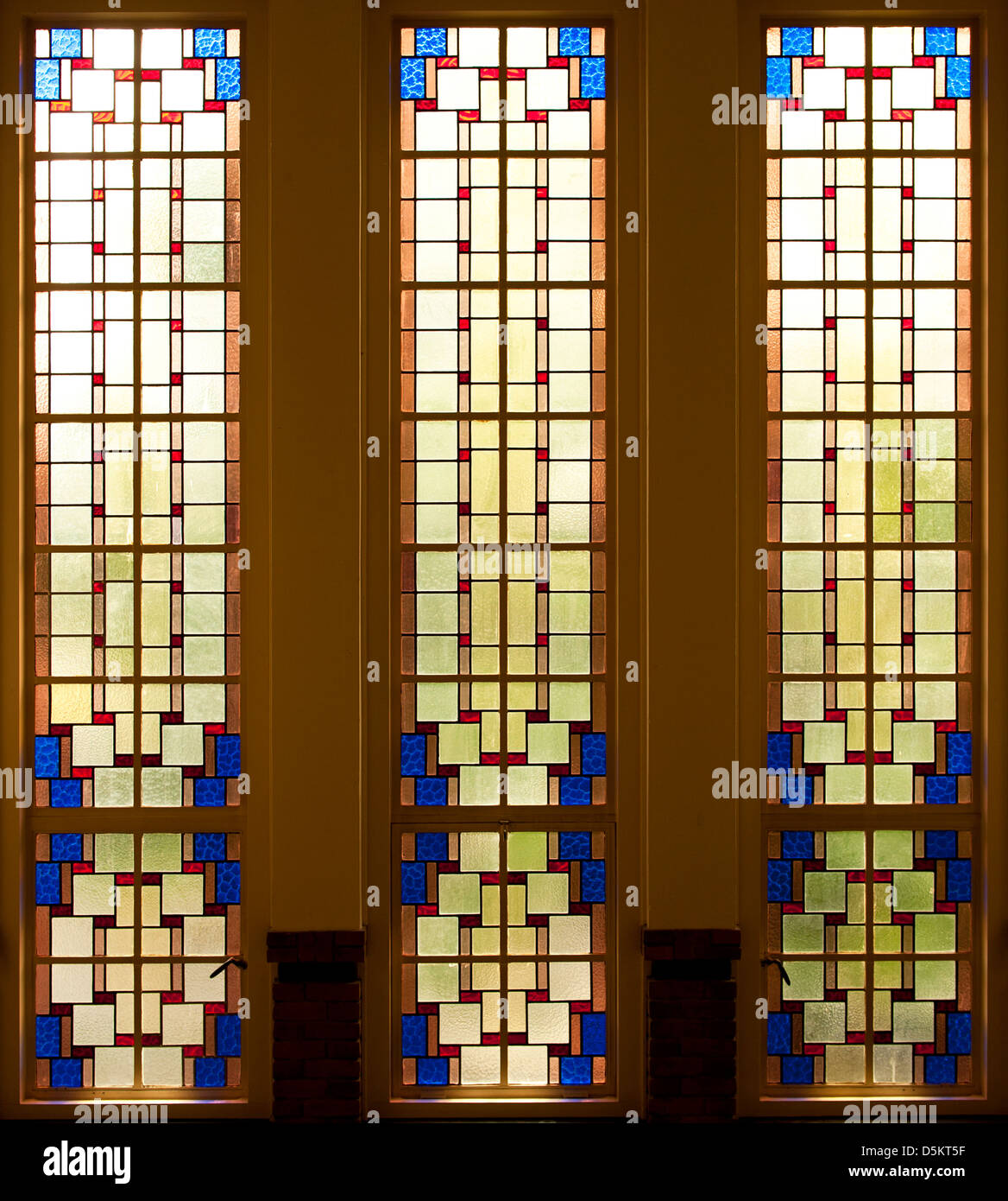 vertical stained glass windows leaving a colorful pattern Stock Photo ...