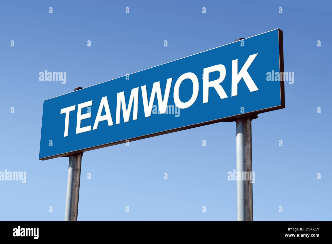 Blue metal roadsign with Teamwork word over blue sky Stock Photo