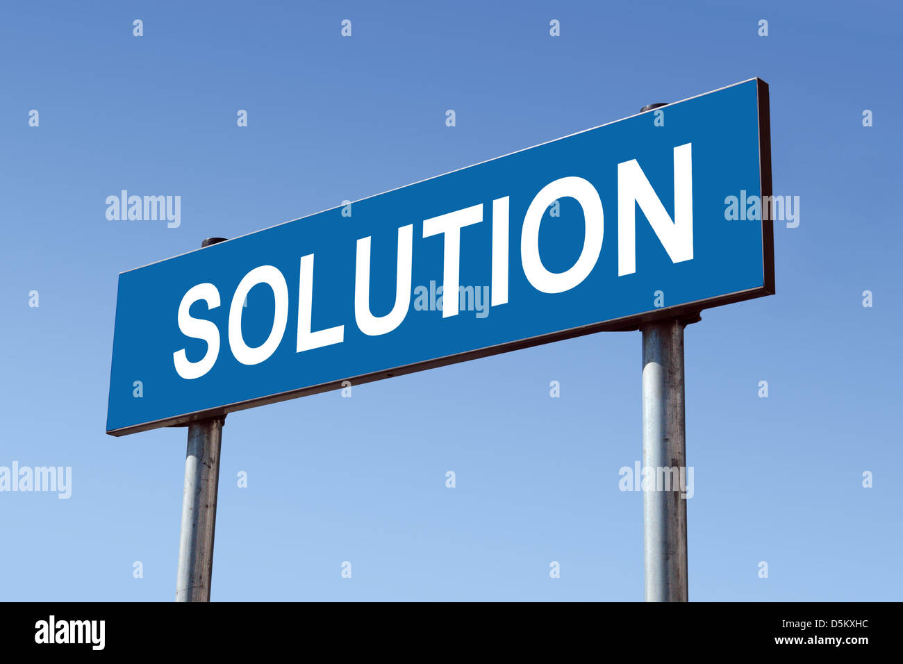 Metal roadsign spelling Solution word over blue sky Stock Photo