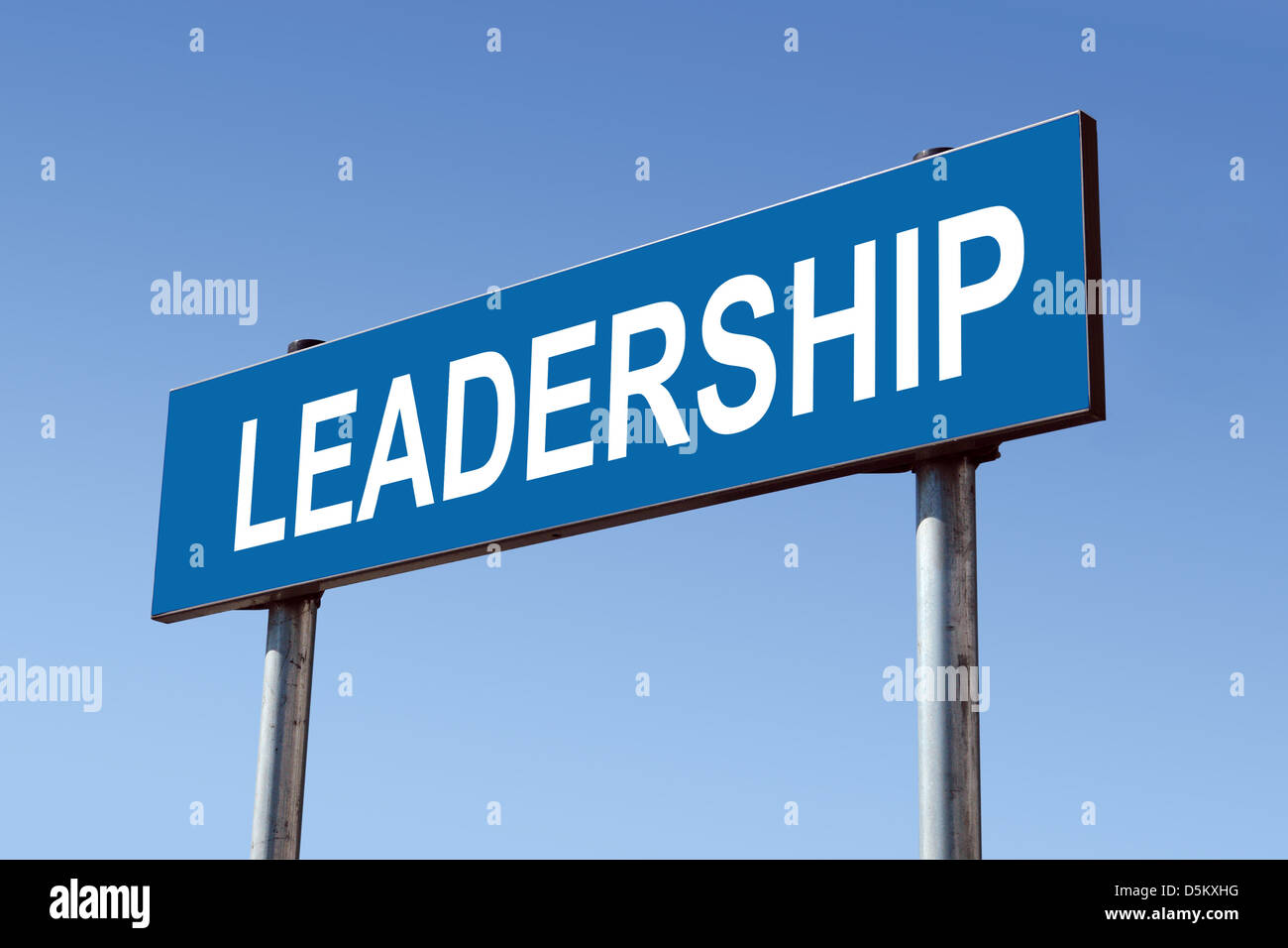 Metal roadsign spelling Leadership word over blue sky Stock Photo