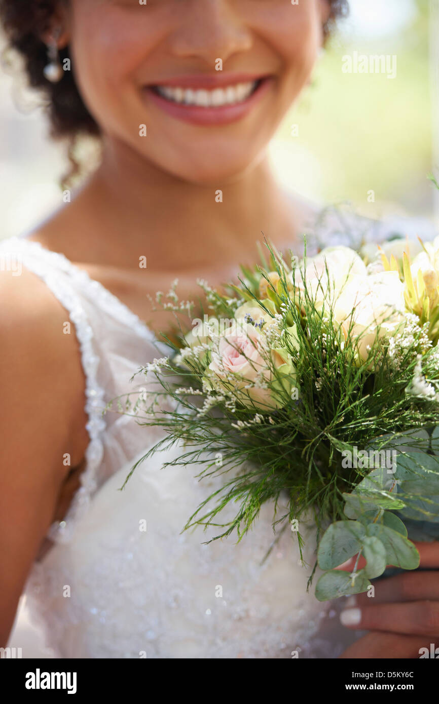 Portrait of bride with bouquet Stock Photo - Alamy