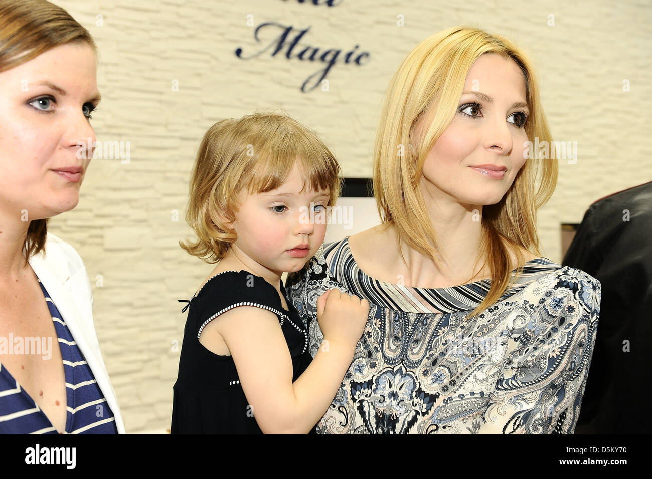 Ivana Gottova and her daughters Charlotte Ella and Nelly Sofie attend the opening of a Victoria Magic children's shoe store Stock Photo