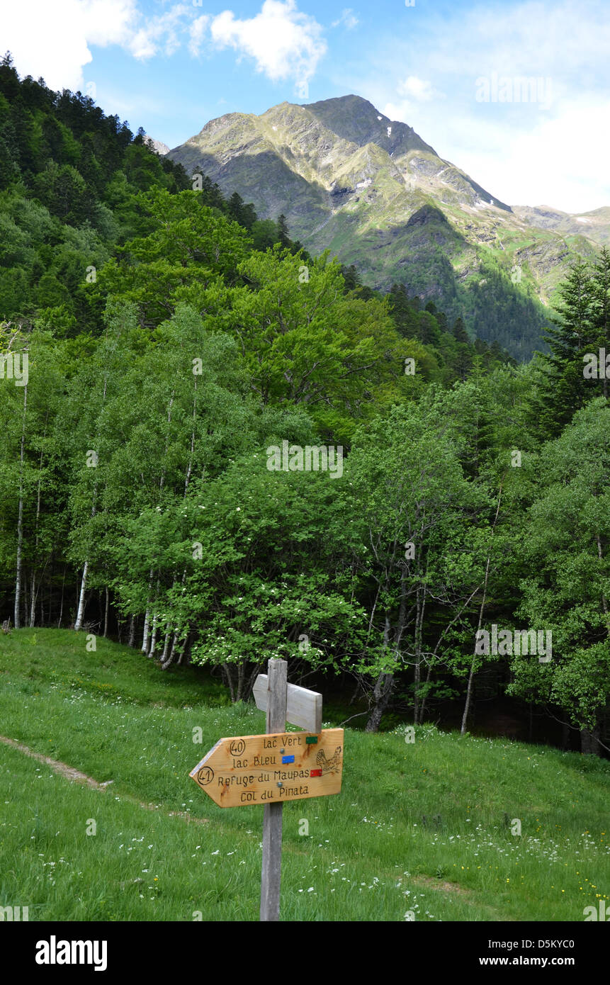 A wooden directory for hikers in a high valley in the french Pyrenees near Bagneres de Luchon Stock Photo