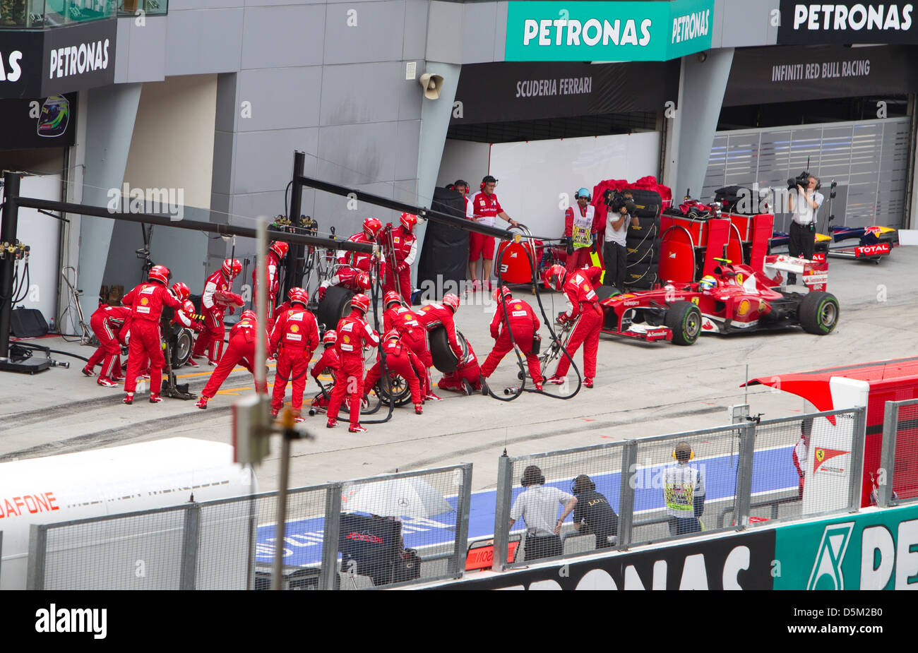 Felipe Massa of Team Ferrari enters pit for tyres at Malaysian F1 GP Stock Photo
