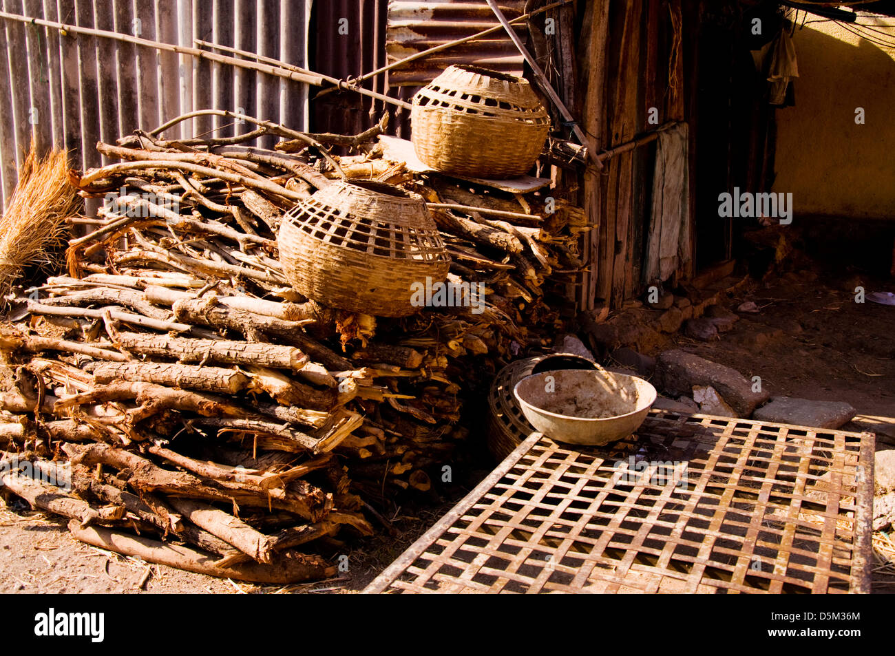 Detail kindling wood and pots baskets in Khubalivali Village Mulshi
