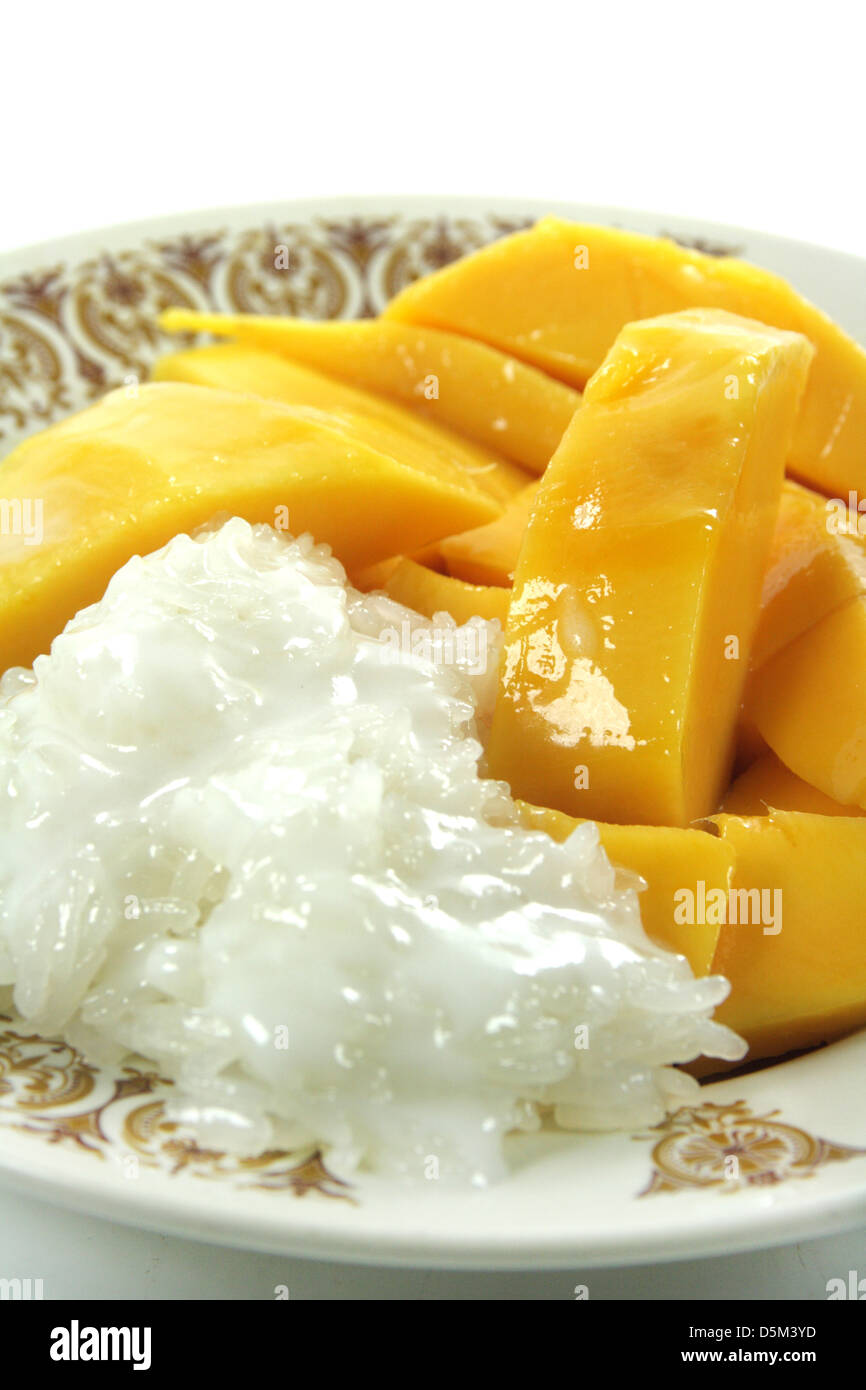 Thai Mango with Sticky Rice and Coconut Sauce Dessert Stock Photo Alamy