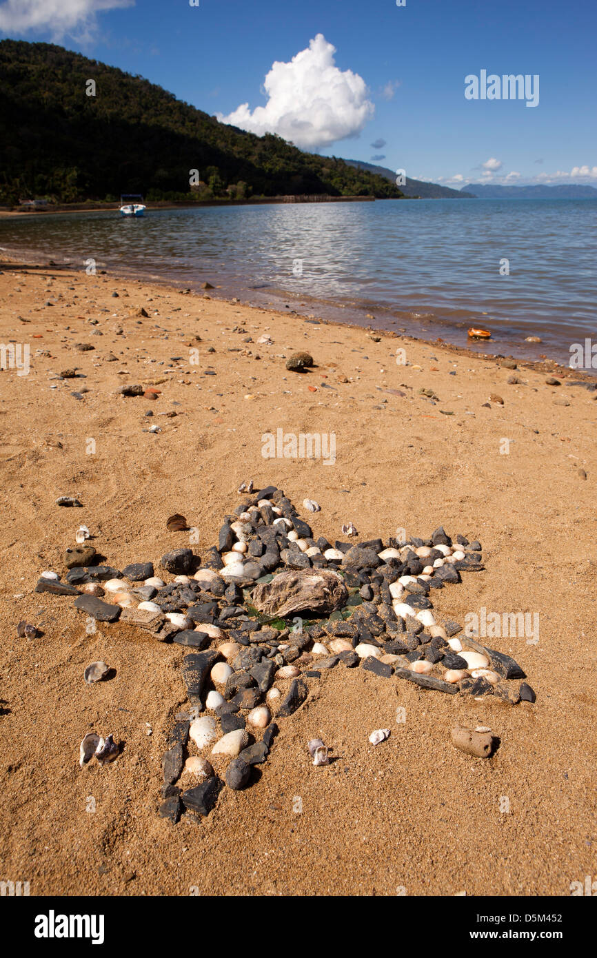 Madagascar, Nosy Be, Marodokana, beach art star sculpture made from found stones & shells Stock Photo
