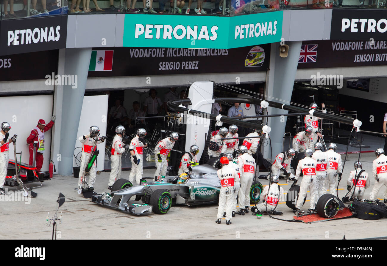 Lewis Hamilton wrongly enters McLaren pit at Malaysian F1 GP Stock Photo