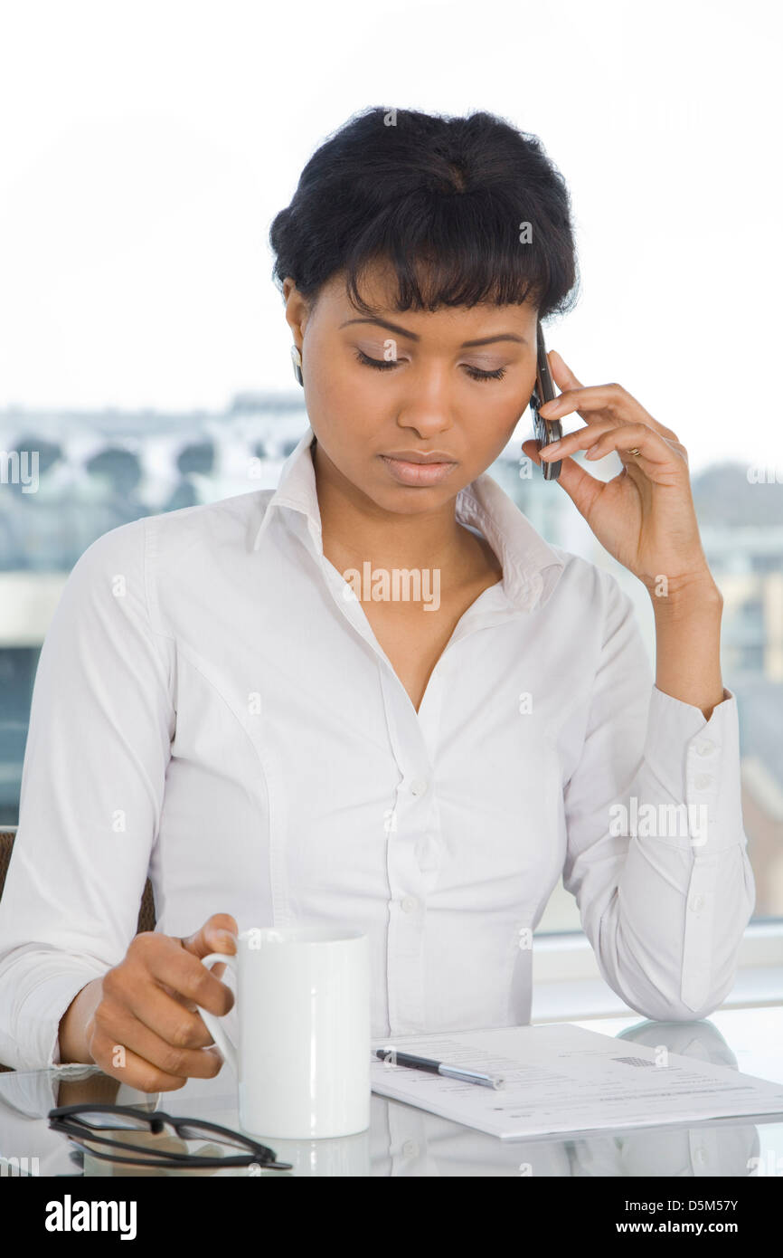 Young black business woman at work Stock Photo - Alamy