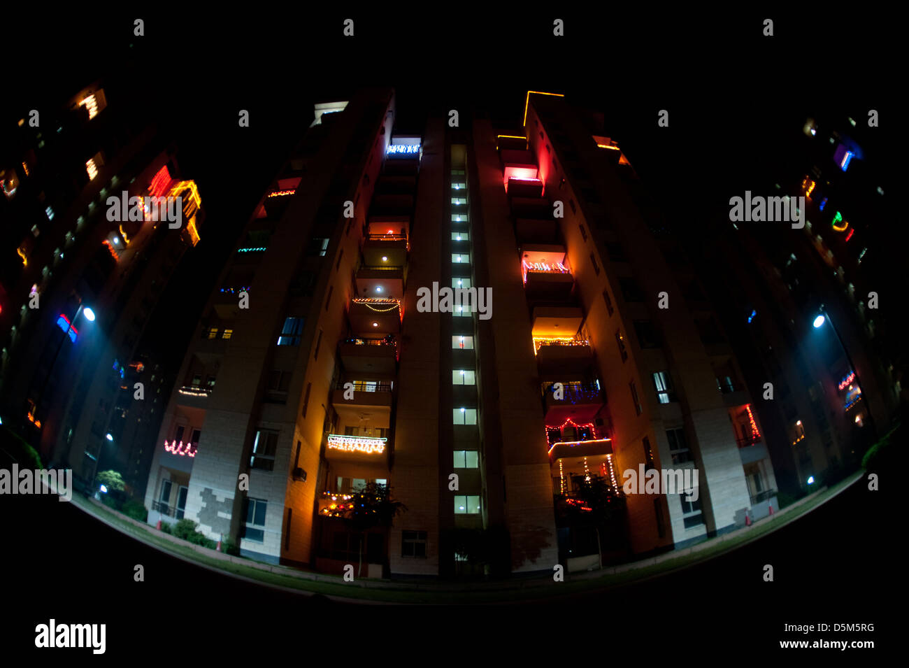 Divali lights decorate several blocks of apartments, Gurgaon, India. Stock Photo