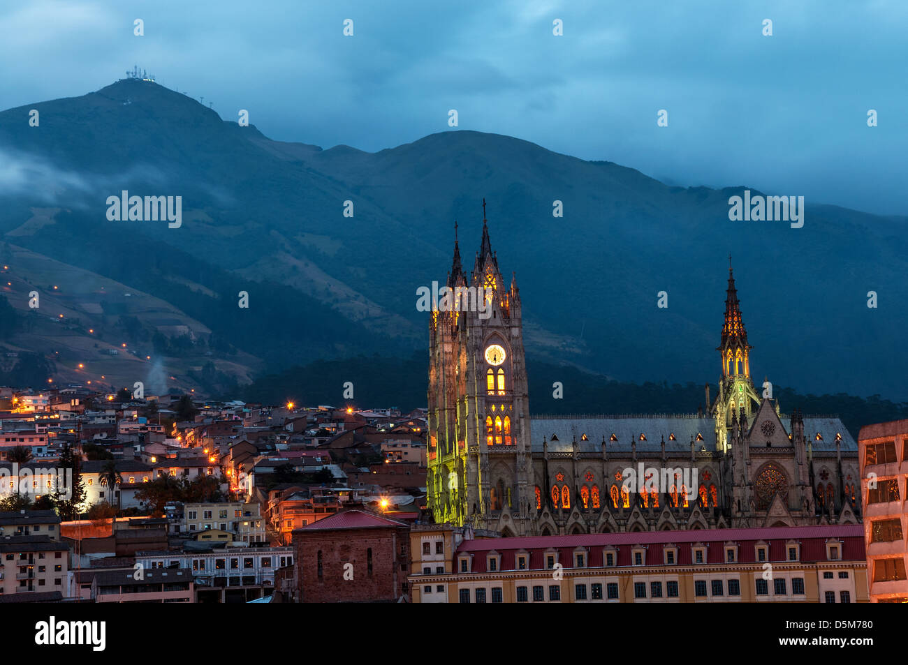 Night time view of the basilica and old town in Quito, Ecuador Stock Photo