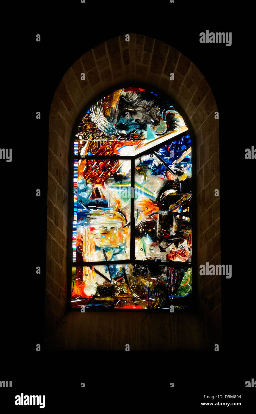 Stained galss window in the cathedral in Cefelu, Sicily, Italy. Stock Photo