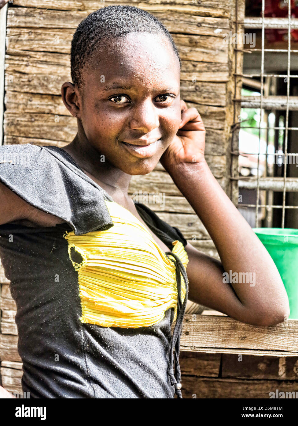 Young Female Teenager Posing For Camera In Africa East Africa Tanzania Young Female Teenager Posing For Camera In Africa East Africa Tanzania
